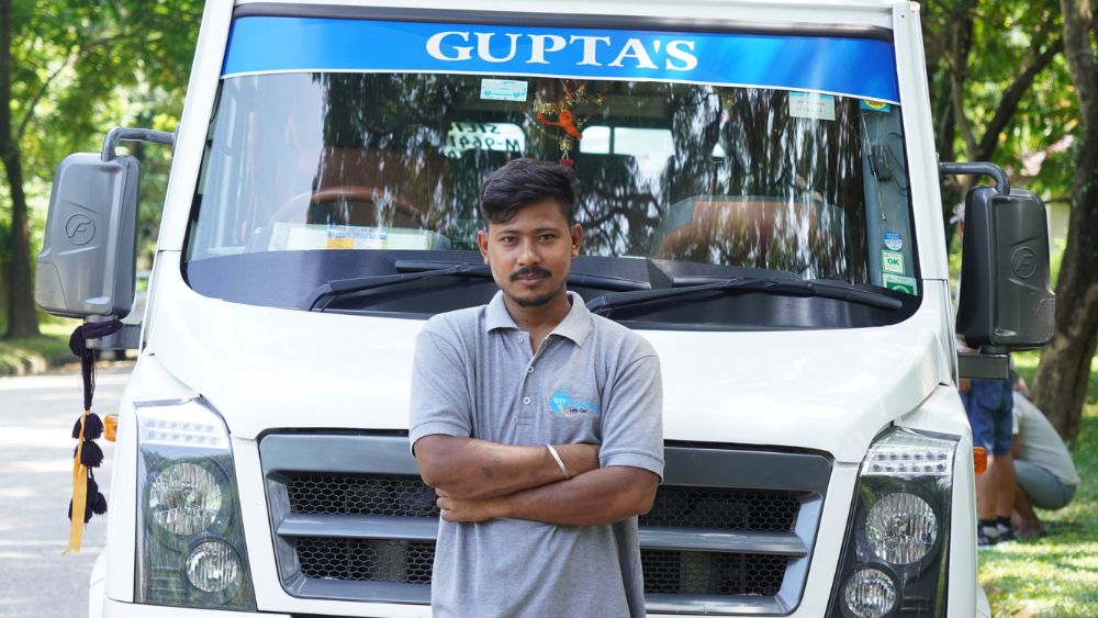 professional driver with tempo traveller
